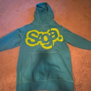 Saga outerwear (popular winter sports brand), large tall, turquoise w/ green